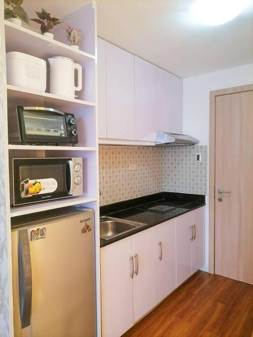 Cozy Studio Unit At Sun Residences 케손시티 외부 사진